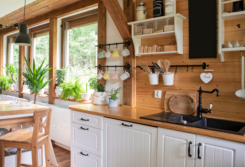 Cottage style kitchen and dining room with wooden accents