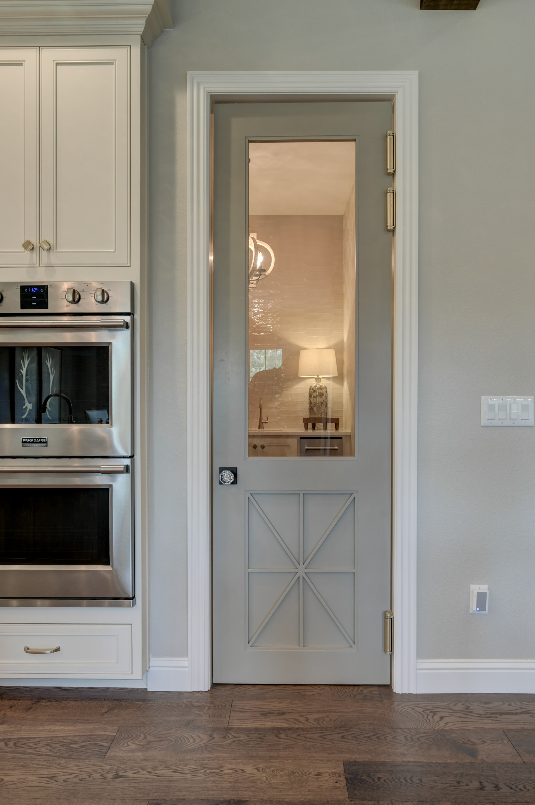thin gray door in kitchen
