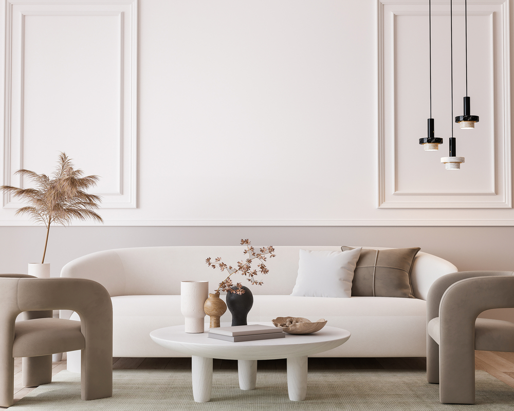 A serene living room with a neutral color palate and a modern, minimal aesthetic